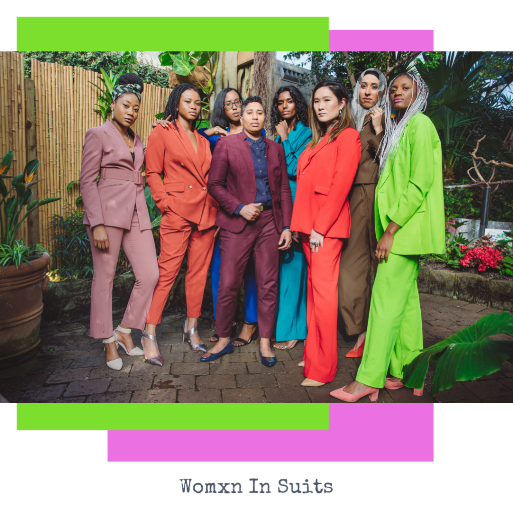 a group of women in brightly coloured suits